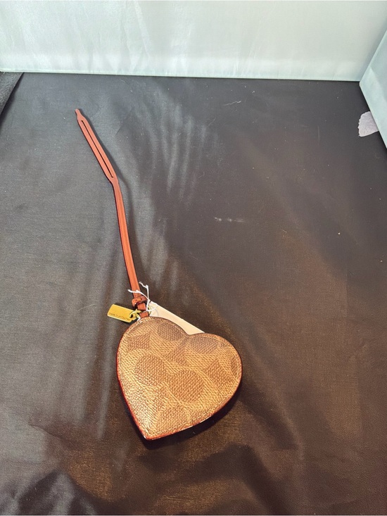 Coach Handbags - Coach Heart bag charm in Brown with Red Trim
